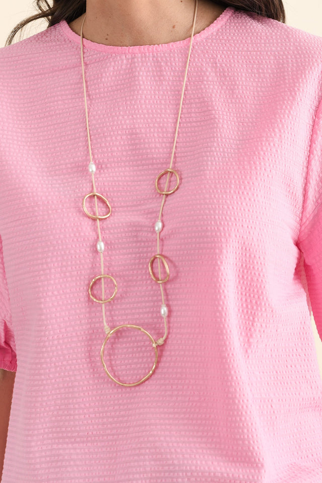 Astrid Pink Cotton Textured Top,brunette model,Close up of outfit,alt text|model:MJ image 5