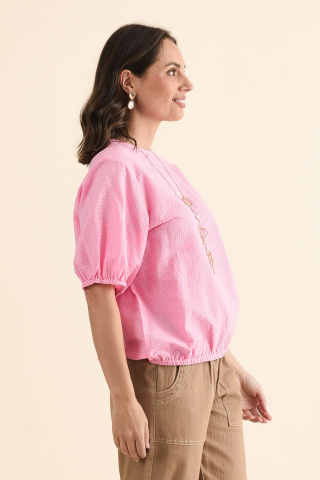 Astrid Pink Cotton Textured Top,brunette model,Side of Outfit,alt text|model:MJ image 3