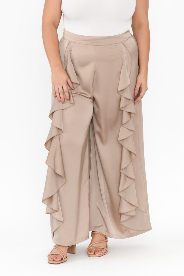 Dancer Taupe Ruffle Pants,Brunette model,plus-size,plus-size-evening-dresses,plus-size-wedding-guest-dresses,plus-size-cocktail-dresses,plus-size-formal-dresses,plus-size-mother-of-the-bride-dresses,plus-size-race-day-dresses,curve-bottoms,plus-size-Pants,alt text|model:Gabby