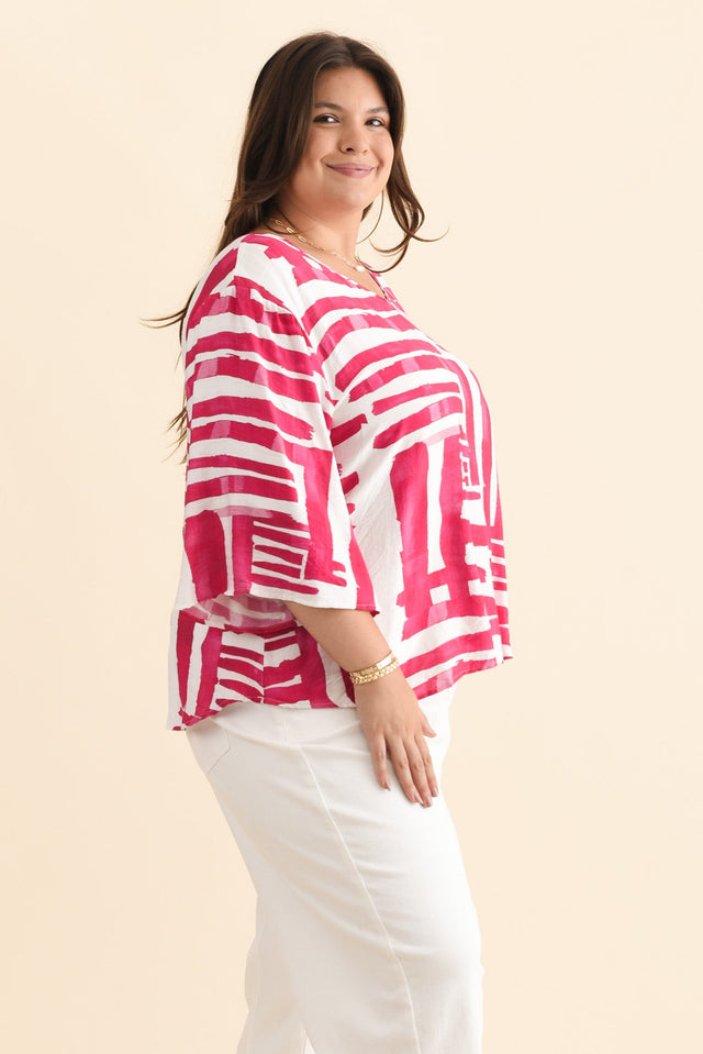 Janelle Pink Geo V Neck Top,Brunette model,alt text|model:Gabby image 10