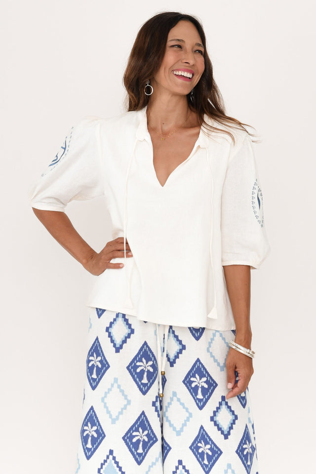 Steph Cream Seashell Embroidered Linen Top,Brunette model,alt text|model:Cara image 1