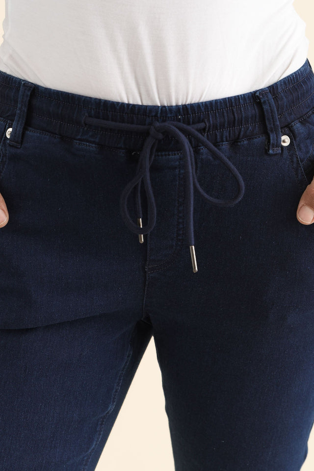 Whistler Navy Cotton Jogger Pants,brunette model,Close up of outfit,alt text|model:Cara image 5