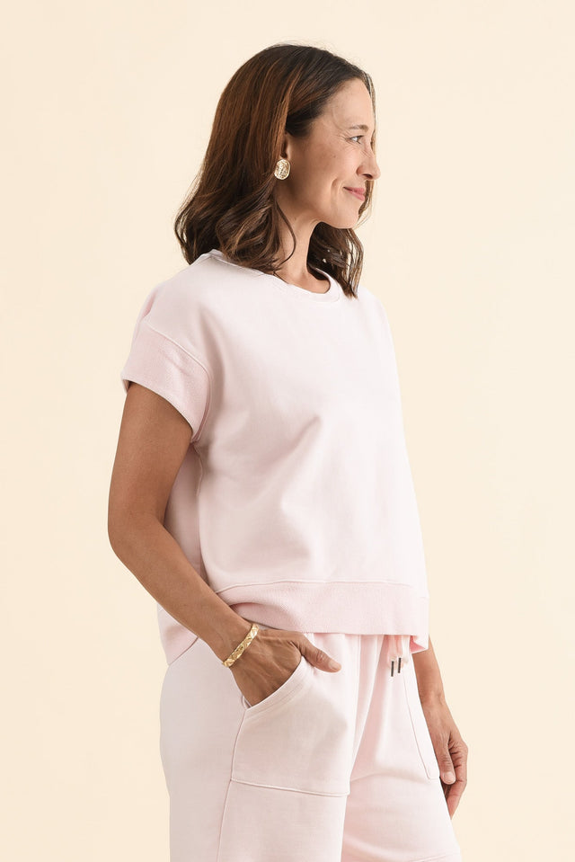 Hustler Light Pink Cotton Tee,Side,Brunette model,alt text|model:Cara image 3