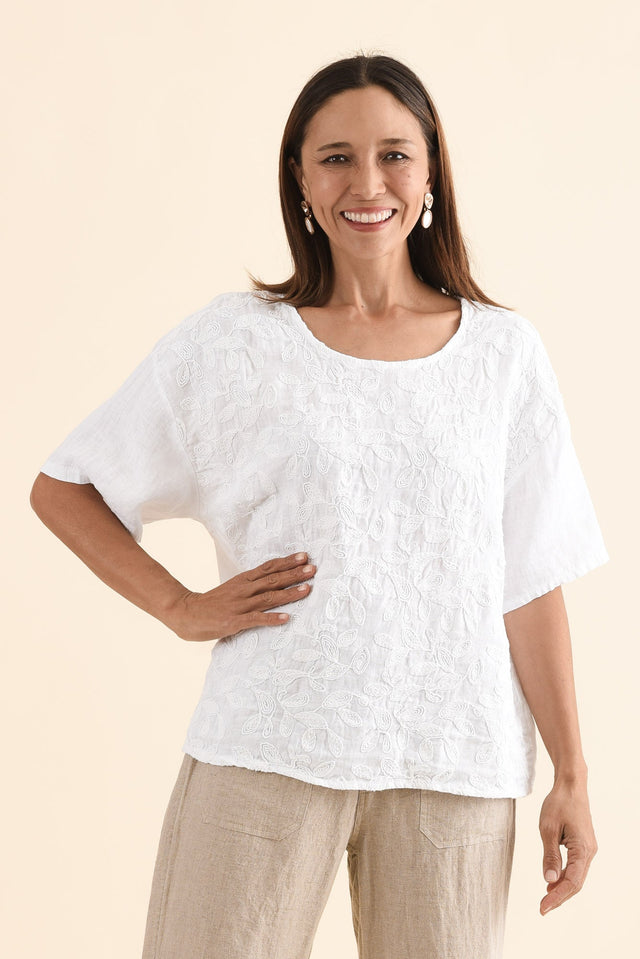 Odia White Abstract Linen Embroidered Top,Front,Brunette model,alt text|model:Cara image 1