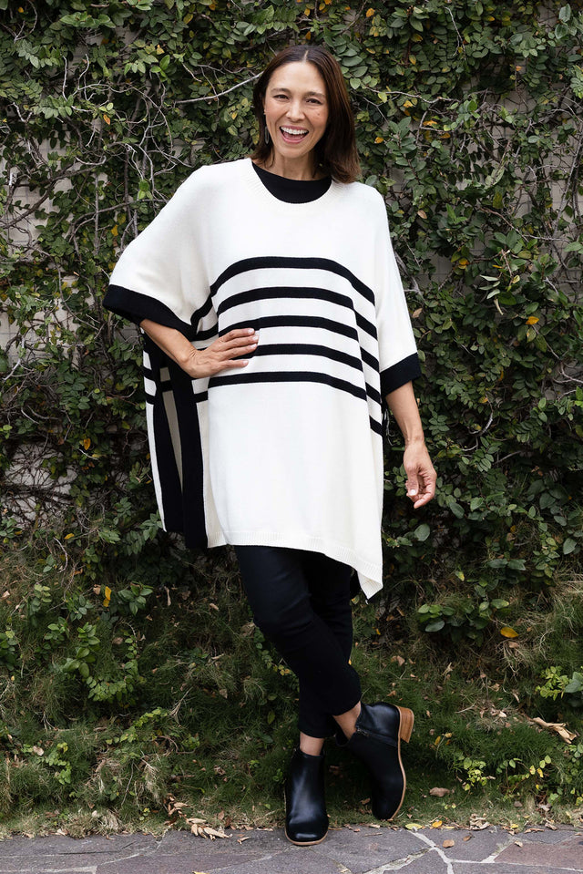 Fidelia White Stripe Knit Poncho,Brunette model,Lifestyle